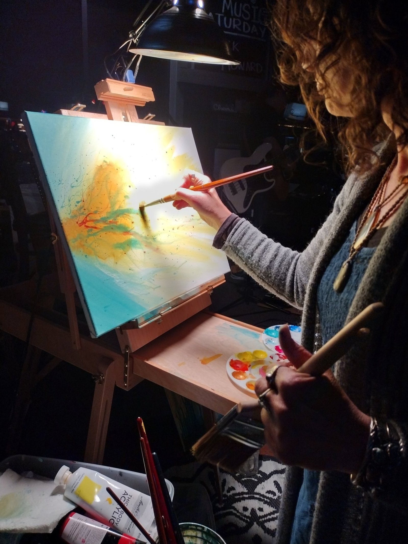 Angela Bradley (Just a Vessel) live-painting with watercolor at an event